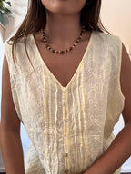 Light yellow button up top