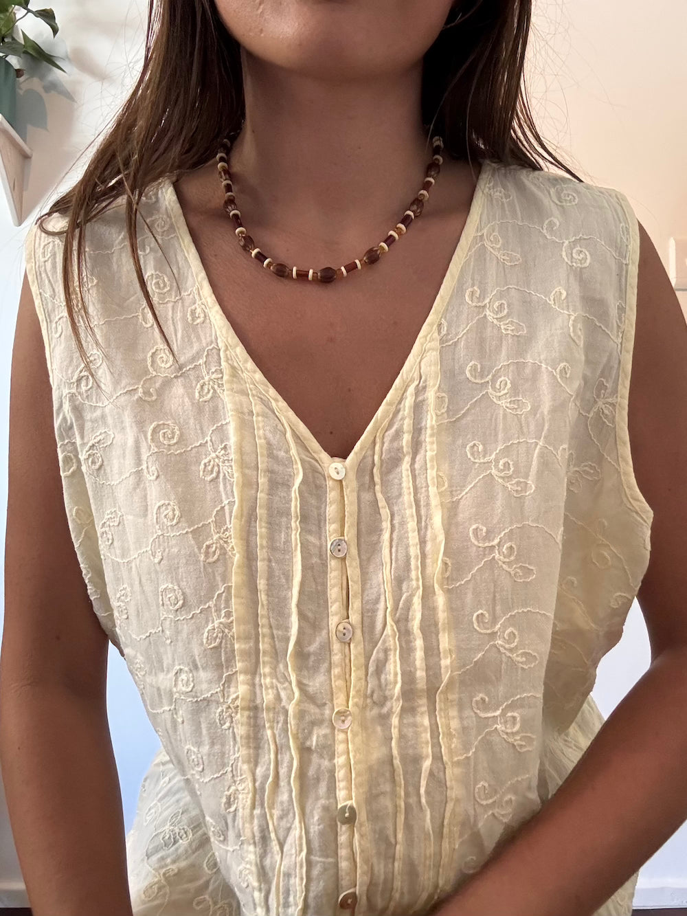 Light yellow button up top